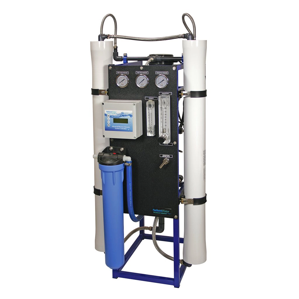 Commercial water treatment skid with filter housings, pressure gauges and a control head