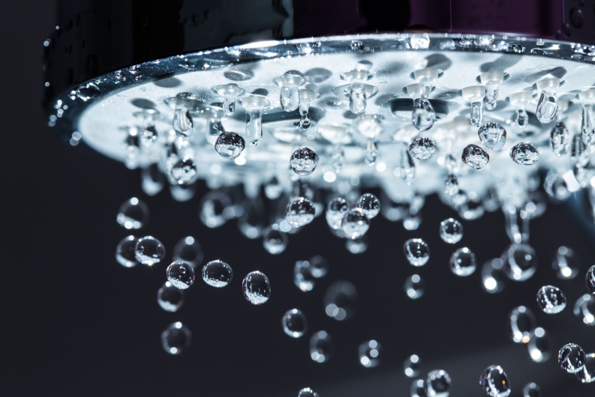 Water droplets falling from a clean showerhead